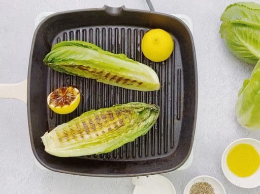 Griddled snack lettuce with parmesan and lemon dressing